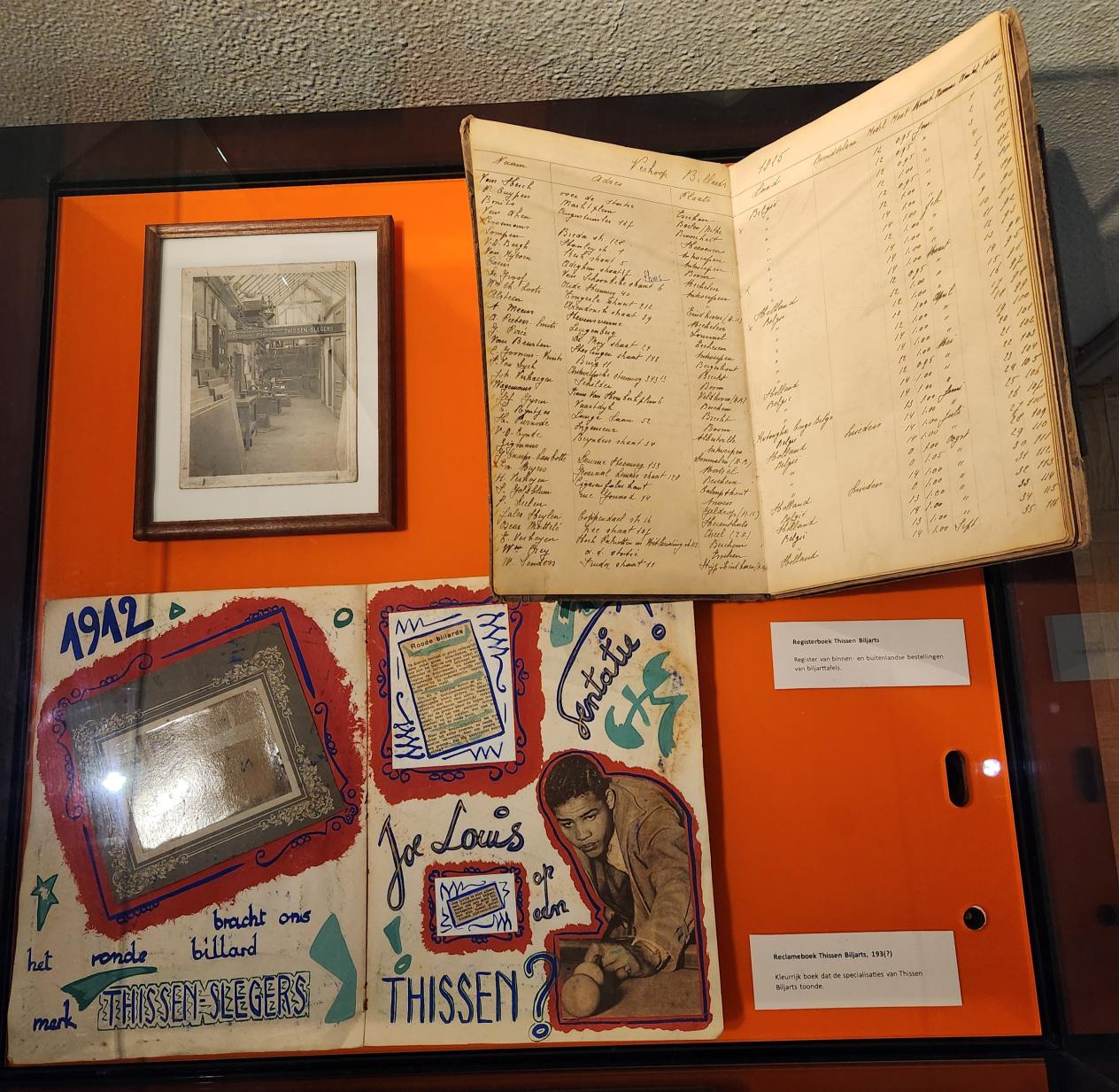 Handelsregister en reclameboek (beide uit de jaren ’30) van Thissen.